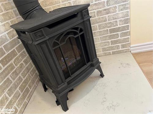 34 Nancy Street, Wasaga Beach, ON - Indoor Photo Showing Other Room With Fireplace