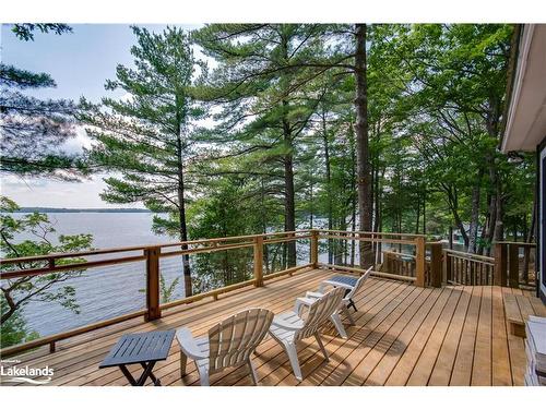 1384 Browning Island, Bracebridge, ON - Outdoor With Body Of Water With Deck Patio Veranda With Exterior