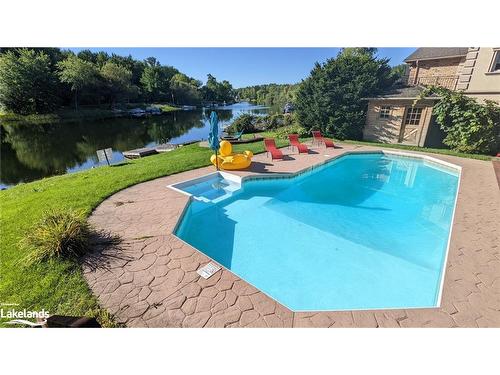 1815 Peninsula Point Road, Severn, ON - Outdoor With In Ground Pool With Backyard