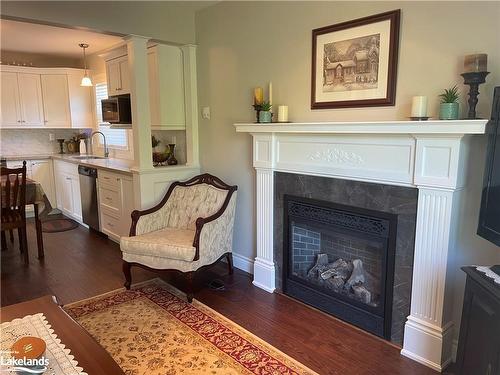 1 Vics Road, Midland, ON - Indoor Photo Showing Living Room With Fireplace