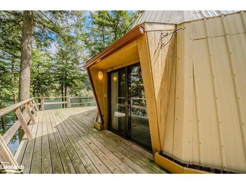 1075 Blue Lake Road, Huntsville, ON - Outdoor With Deck Patio Veranda With Exterior