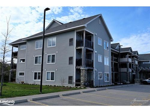 300-2 Cove Court, Collingwood, ON - Outdoor With Balcony With Facade