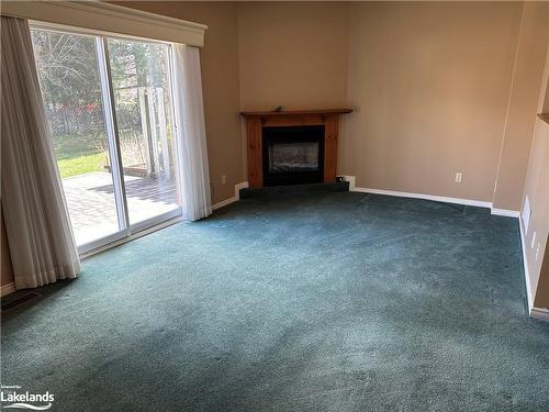 301 Thomas Street, Stayner, ON - Indoor Photo Showing Living Room With Fireplace