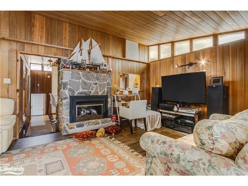 38 Forest Harbour Parkway, Waubaushene, ON - Indoor Photo Showing Living Room With Fireplace