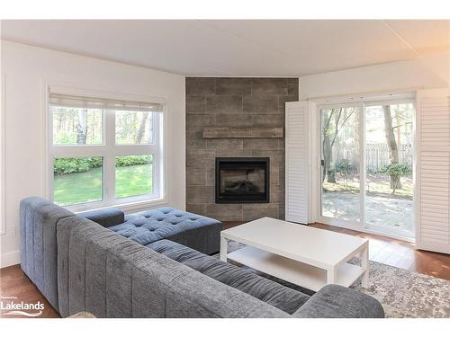 411 Mariners Way, Collingwood, ON - Indoor Photo Showing Living Room With Fireplace