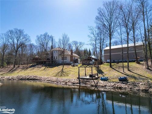 756 Spring Lake Road, South River, ON - Outdoor With Body Of Water With View