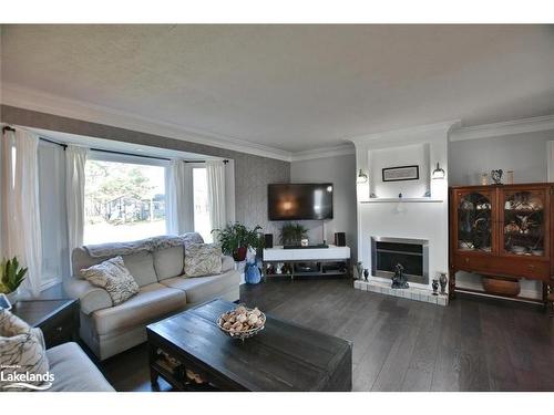 52 Downer Crescent, Wasaga Beach, ON - Indoor Photo Showing Living Room With Fireplace