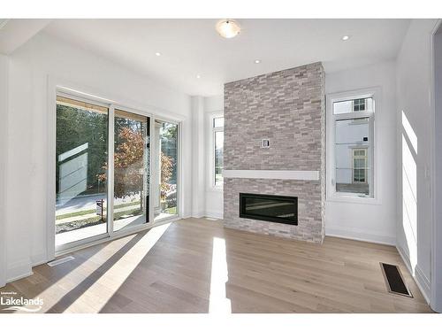 10-11 Bay Street E, Thornbury, ON - Indoor Photo Showing Living Room With Fireplace