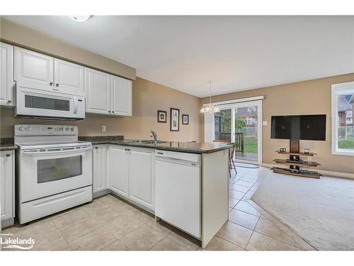 47 Whitfield Crescent, Elmvale, ON - Indoor Photo Showing Kitchen With Double Sink