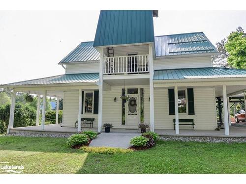 2434 Old Muskoka Road, Huntsville, ON - Outdoor With Deck Patio Veranda With Facade