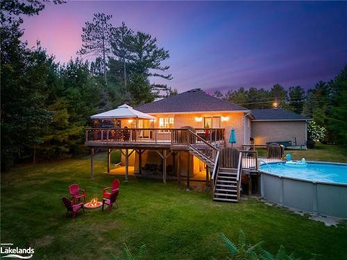 645 River Road E, Wasaga Beach, ON - Outdoor With Above Ground Pool With Deck Patio Veranda With Backyard