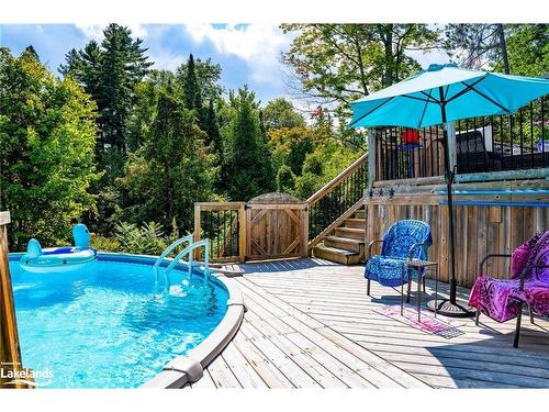 645 River Road E, Wasaga Beach, ON - Outdoor With Above Ground Pool With Deck Patio Veranda
