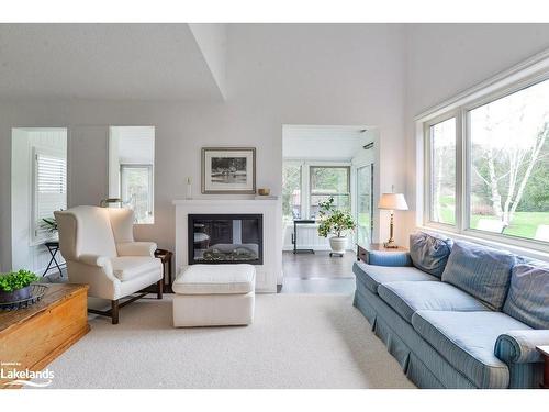 2-15 Golf Course Road, Bracebridge, ON - Indoor Photo Showing Living Room With Fireplace