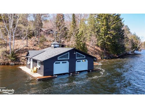 1215 Ronville Road, Dwight, ON - Outdoor With Body Of Water