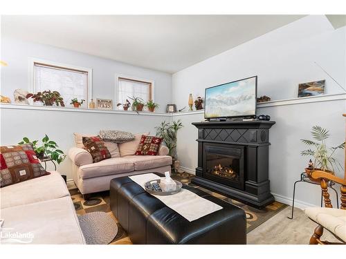 255 Town Line Road W, Huntsville, ON - Indoor Photo Showing Living Room With Fireplace