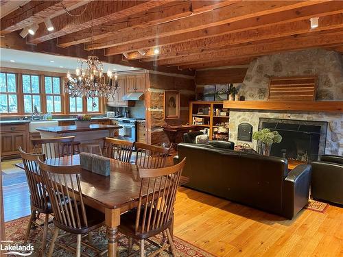133 Kitzbuhl Crescent, The Blue Mountains, ON - Indoor Photo Showing Dining Room With Fireplace