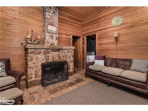 216 Shore Line E, Wasaga Beach, ON - Indoor Photo Showing Living Room With Fireplace