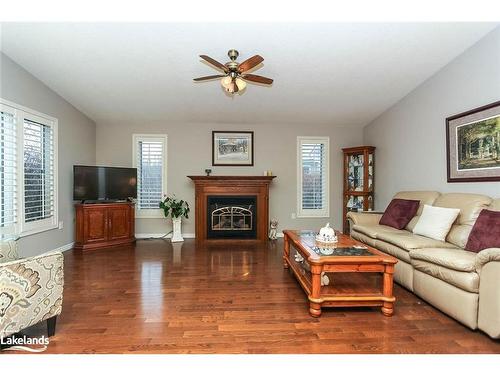 8 Pennsylvania Avenue, Wasaga Beach, ON - Indoor Photo Showing Living Room With Fireplace