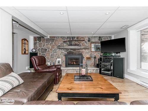 585 Deer Lake Road, Port Sydney, ON - Indoor Photo Showing Living Room With Fireplace