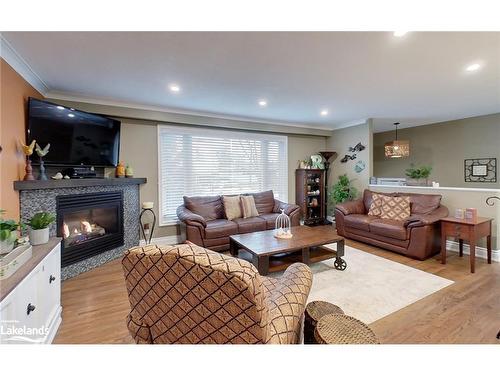 213 Hamilton Drive, Stayner, ON - Indoor Photo Showing Living Room With Fireplace