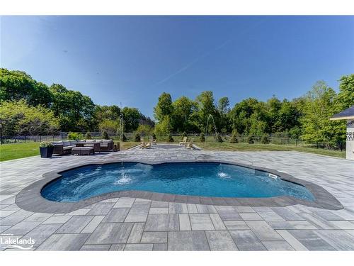 91 Windermere Circle, Tay Twp, ON - Outdoor With In Ground Pool With Backyard