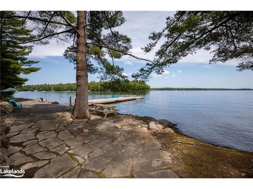 29 Island 26Lm, Gravenhurst, ON - Outdoor With Body Of Water With Deck Patio Veranda With Backyard