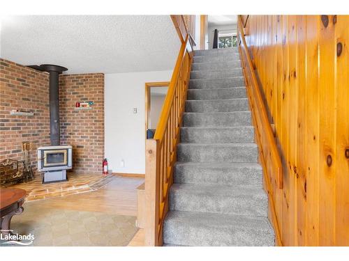 36 Beaver Trail, Mcdougall, ON - Indoor Photo Showing Other Room With Fireplace