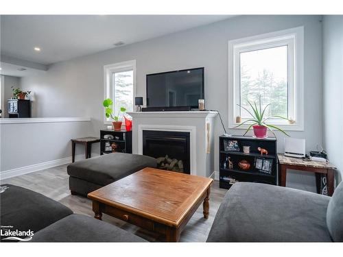 10 Elm Drive, Wasaga Beach, ON - Indoor Photo Showing Living Room With Fireplace
