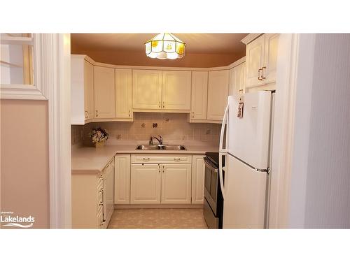57-275 Huron Street, Stayner, ON - Indoor Photo Showing Kitchen With Double Sink