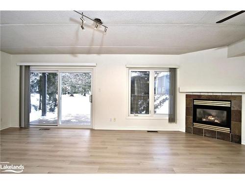 707 Johnston Park Avenue, Collingwood, ON - Indoor Photo Showing Living Room With Fireplace