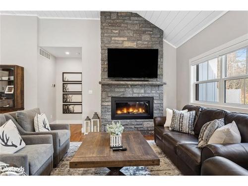 189 Balsam Chutes Road, Port Sydney, ON - Indoor Photo Showing Living Room With Fireplace