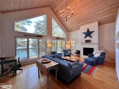 1032 Artisan Lane, Eagle Lake, ON - Indoor Photo Showing Living Room With Fireplace