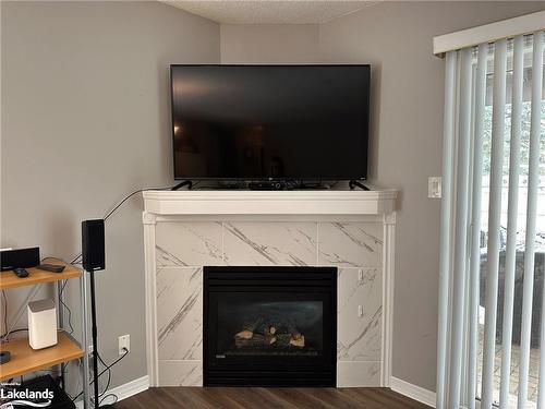 2-289 Mariners Way, Collingwood, ON - Indoor Photo Showing Living Room With Fireplace