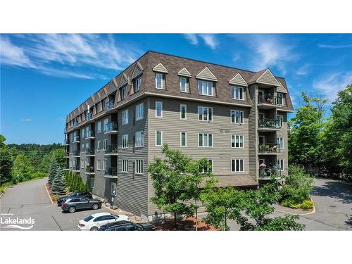 105-26 Dairy Lane, Huntsville, ON - Outdoor With Balcony With Facade