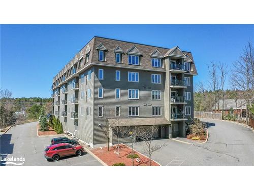 105-26 Dairy Lane, Huntsville, ON - Outdoor With Balcony With Facade