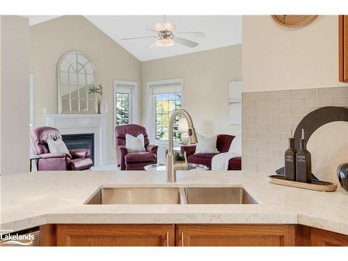 42 Maple Drive, Wasaga Beach, ON - Indoor Photo Showing Kitchen With Fireplace With Double Sink