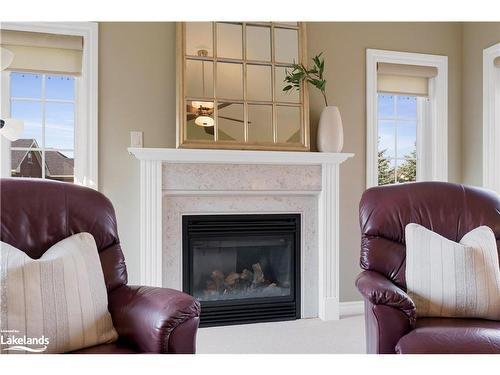 42 Maple Drive, Wasaga Beach, ON - Indoor Photo Showing Living Room With Fireplace