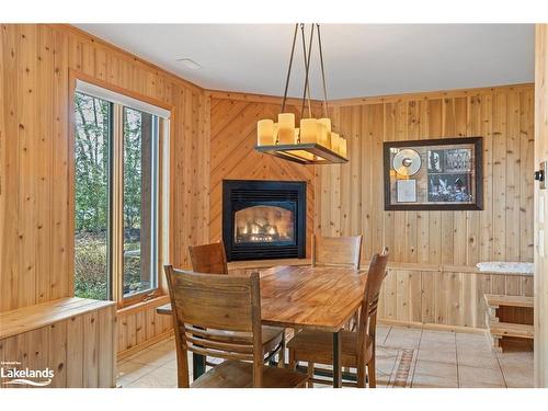 1824 Kilworthy Road, Gravenhurst, ON - Indoor Photo Showing Dining Room With Fireplace