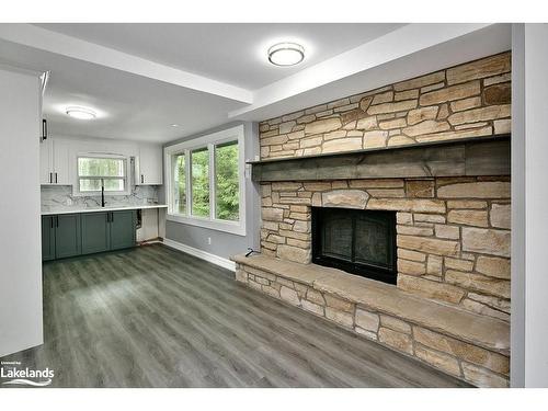 208550 26 Highway, The Blue Mountains, ON - Indoor Photo Showing Living Room With Fireplace