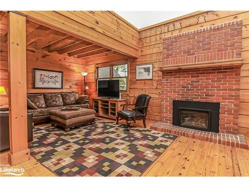 105 Hoyt Avenue, Victoria Harbour, ON - Indoor Photo Showing Living Room With Fireplace