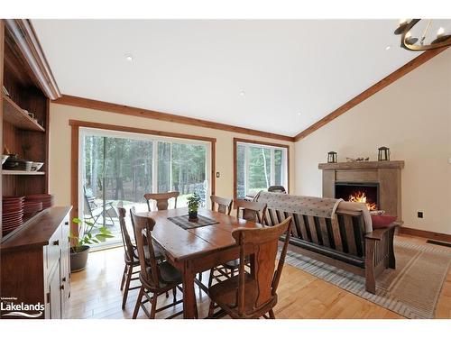 1214 Ursa Road, Highlands East, ON - Indoor Photo Showing Dining Room With Fireplace