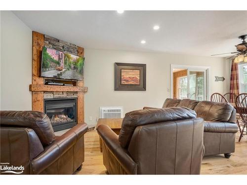 107-3-1052 Rat Bay Road, Lake Of Bays (Twp), ON - Indoor Photo Showing Living Room With Fireplace