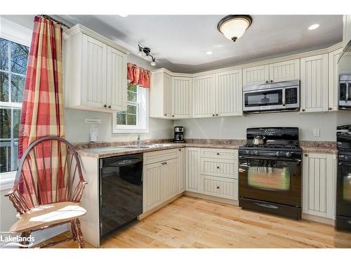 107-3-1052 Rat Bay Road, Lake Of Bays (Twp), ON - Indoor Photo Showing Kitchen With Double Sink