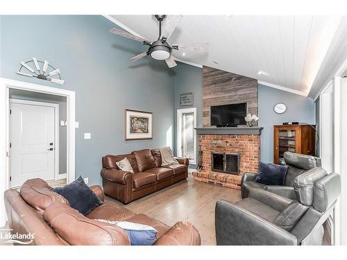 1030 Ziska Road, Bracebridge, ON - Indoor Photo Showing Living Room With Fireplace