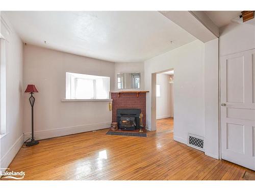 83 Penetang Street, Orillia, ON - Indoor Photo Showing Living Room With Fireplace