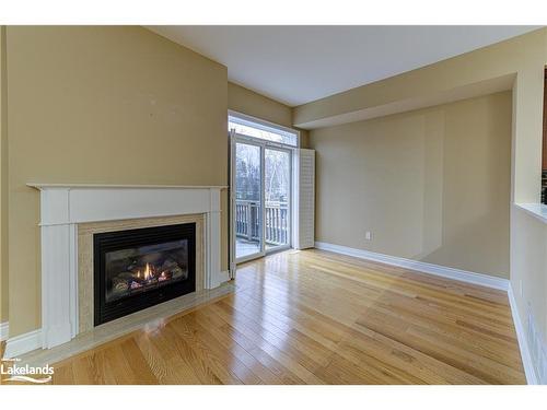 51 Savannah Crescent, Wasaga Beach, ON - Indoor Photo Showing Living Room With Fireplace
