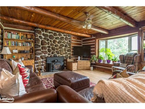 A-411 Peggs Mountain Road, Burk'S Falls, ON - Indoor Photo Showing Living Room With Fireplace