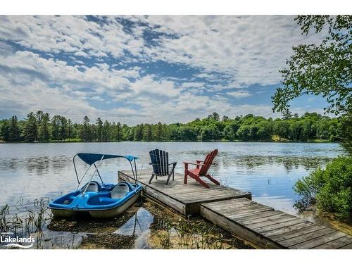 96 Hunts Road, Huntsville, ON - Outdoor With Body Of Water With Deck Patio Veranda With View