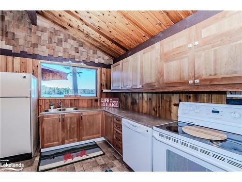 1031 Scout Trail, Port Carling, ON - Indoor Photo Showing Kitchen With Double Sink