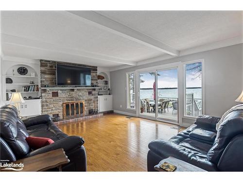 278 Robins Point Road, Victoria Harbour, ON - Indoor Photo Showing Living Room With Fireplace